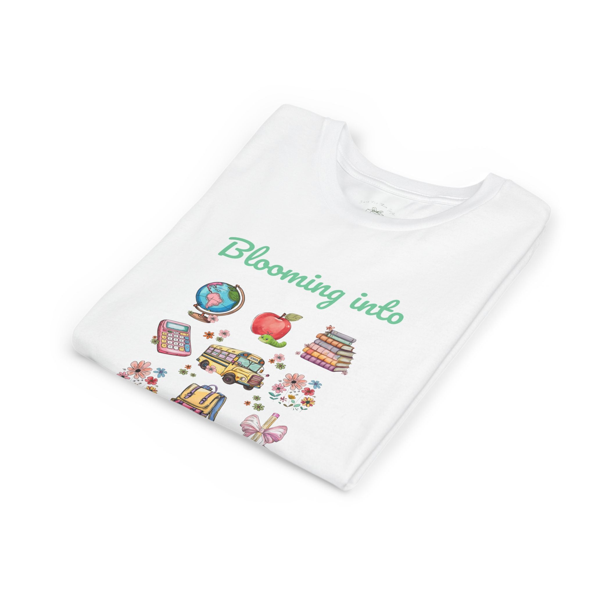 Folded blooming into grade kids t-shirt showing the floral school supplies graphic
