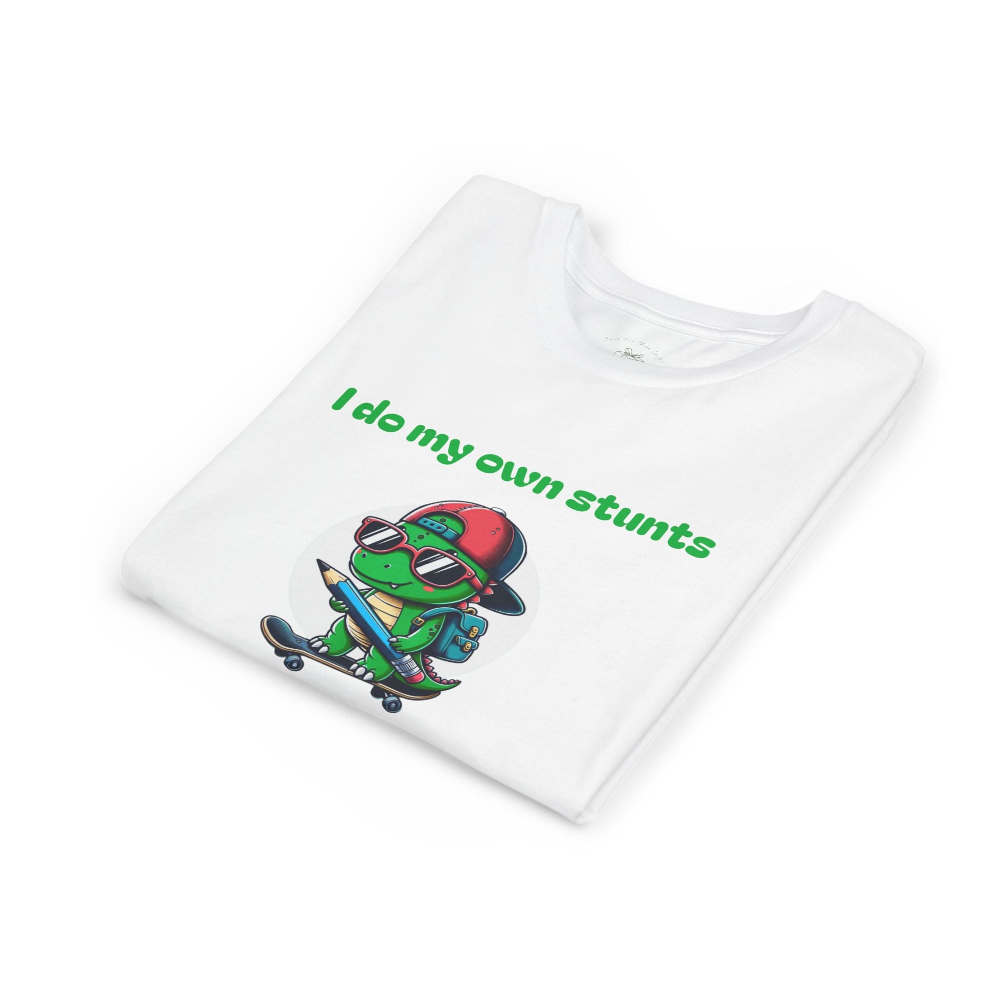Folded rolling into grade dinosaur kids t-shirt showing the skateboard graphic